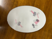 Noritake dinner service for 8 - pattern is number 1357. It has a pink and black pattern - very retro. The set was initially for 12...but as pieces were lost over the years there are now only 9 full sets plus a few extra pieces.  Studio Sonja Milan, Chicago, IL