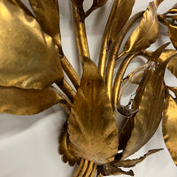 Stunning large gilded wall sconce by Hans Kogl. It has seven arms that have gilded leaves on branches.  Lights are hidden behind certain leaves.  Hollywood Regency Style.  Mid-century corded sconce.