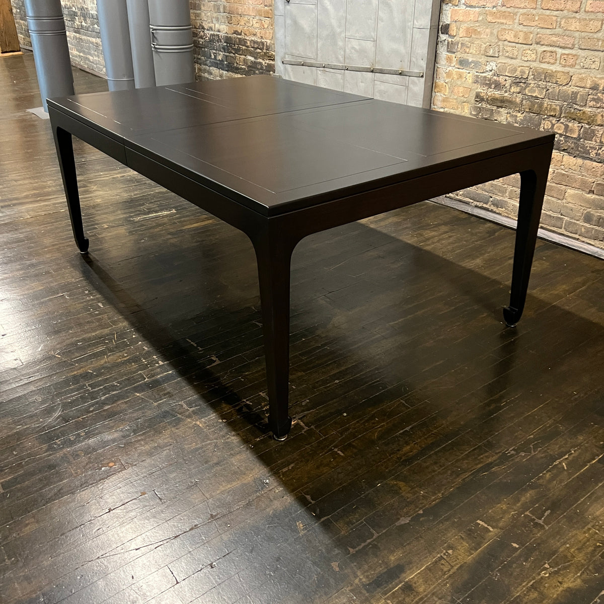 A refinished extension table that Michael Taylor designed for Baker Furniture.  This table starts out as a rectangle but with three impressive leaves it can extend to 122".  It was part of the Far East Collection he did for Baker. Chicago, IL Studio Sonja Milan