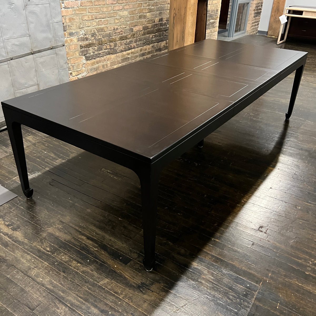 A refinished extension table that Michael Taylor designed for Baker Furniture.  This table starts out as a rectangle but with three impressive leaves it can extend to 122".  It was part of the Far East Collection he did for Baker. Chicago, IL Studio Sonja Milan