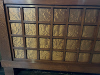 A walnut console cabinet by Berman Rosetti. The piece has 2 doors that slide open to reveal storage inside (one adjustable shelf on either side).  Chicago