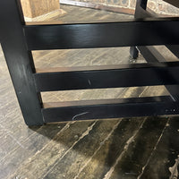 Bold octagonal table by Harvey Probber. Ebonized cross form base and a parquet like travertine top that is inset with an ebonized wood border. Chicago, IL, Studio Sonja Milan