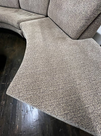 Stunning semi-circular sofa by Erwin Lambeth for John Stuart.   It is now missing its original label (lost during reupholstery) but it is an Erwin Lambeth sofa.  Studio Sonja Milan, Chicago, IL