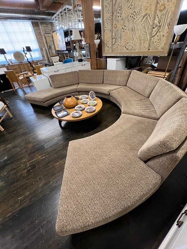 Stunning semi-circular sofa by Erwin Lambeth for John Stuart.   It is now missing its original label (lost during reupholstery) but it is an Erwin Lambeth sofa.  Studio Sonja Milan, Chicago, IL