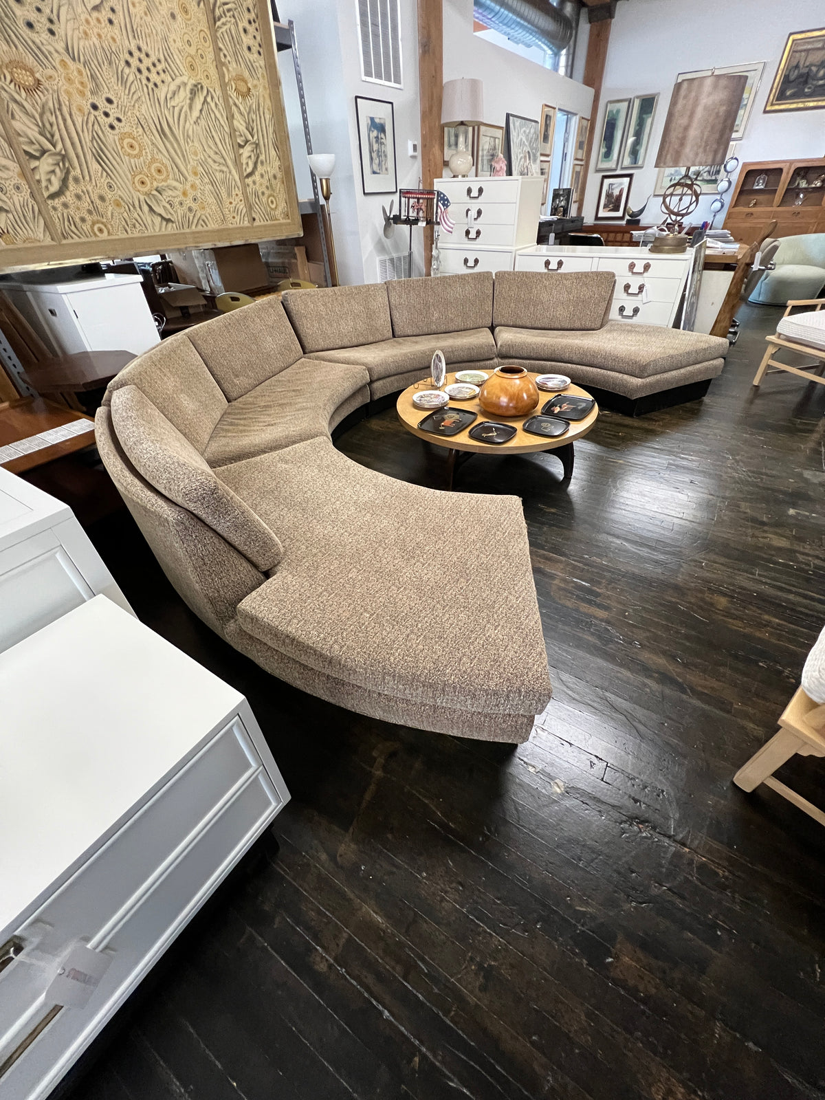 Stunning semi-circular sofa by Erwin Lambeth for John Stuart.   It is now missing its original label (lost during reupholstery) but it is an Erwin Lambeth sofa.  Studio Sonja Milan, Chicago, IL