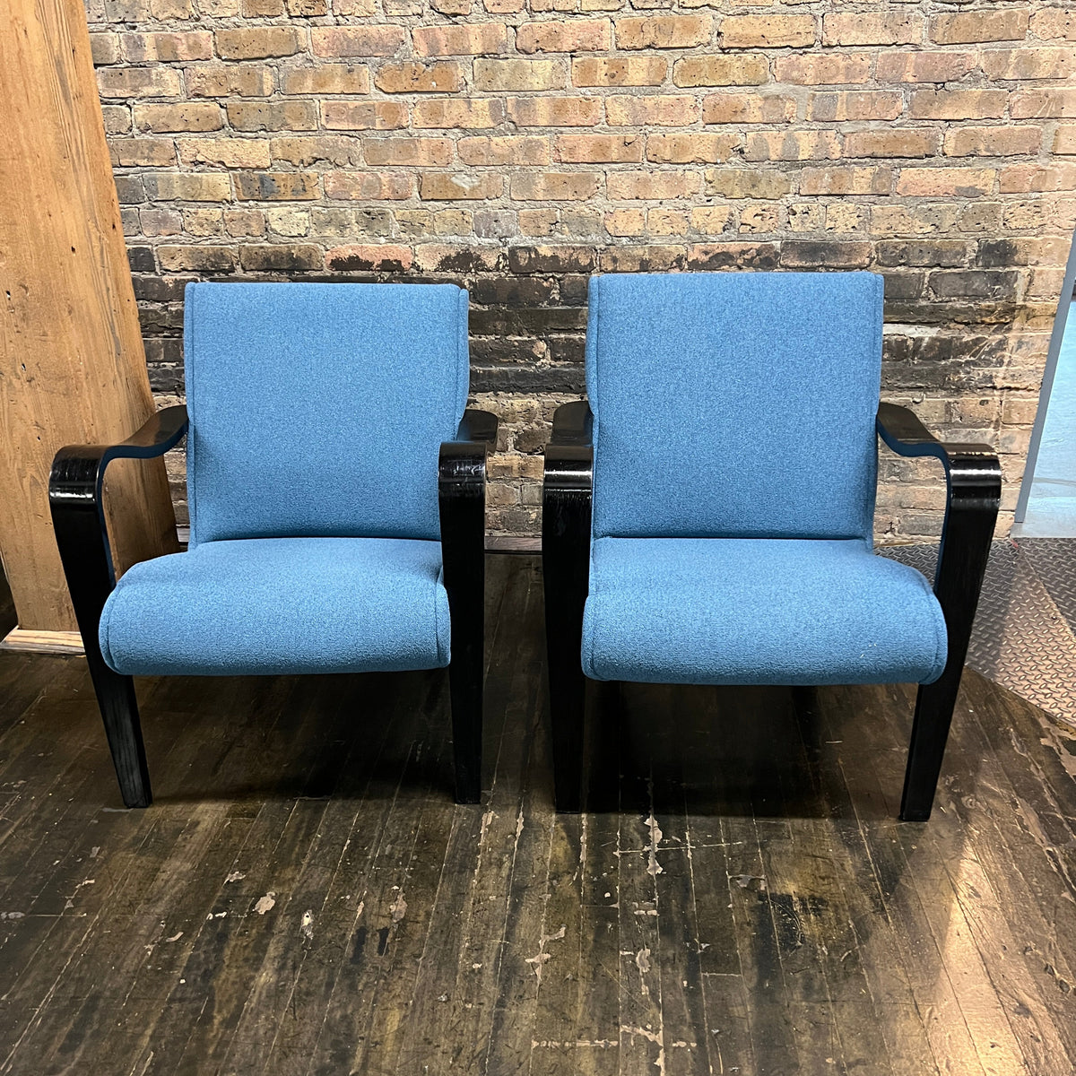 1930's Thonet bentwood lounge chair. The chair features bentwood arms and legs in black lacquer. The chair is solidly constructed and super comfortable