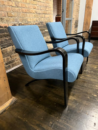 1930's Thonet bentwood lounge chair. The chair features bentwood arms and legs in black lacquer. The chair is solidly constructed and super comfortable