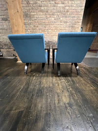 1930's Thonet bentwood lounge chair. The chair features bentwood arms and legs in black lacquer. The chair is solidly constructed and super comfortable.