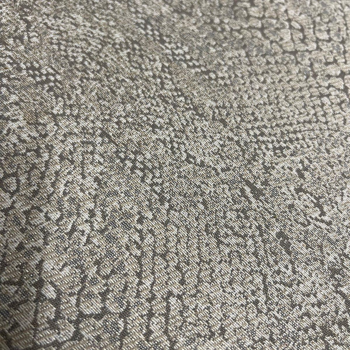 Mid-century curved sectional sofa attributed to Vladimir Kagan for Weiman Furniture. upholstered in a stunning neutral faux snakeskin fabric.