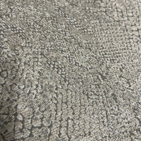 Mid-century curved sectional sofa attributed to Vladimir Kagan for Weiman Furniture. upholstered in a stunning neutral faux snakeskin fabric.