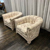 Pair of Art Deco Style Channel Back Lounge Chairs attributed to Baker.  reupholstered some time in the late 70's.  The existing fabric has shades of mauve and lavender on a cream colored background. The fabric is in good shape....but there are some stains at the base of the chair and the arms.  Chicago, IL