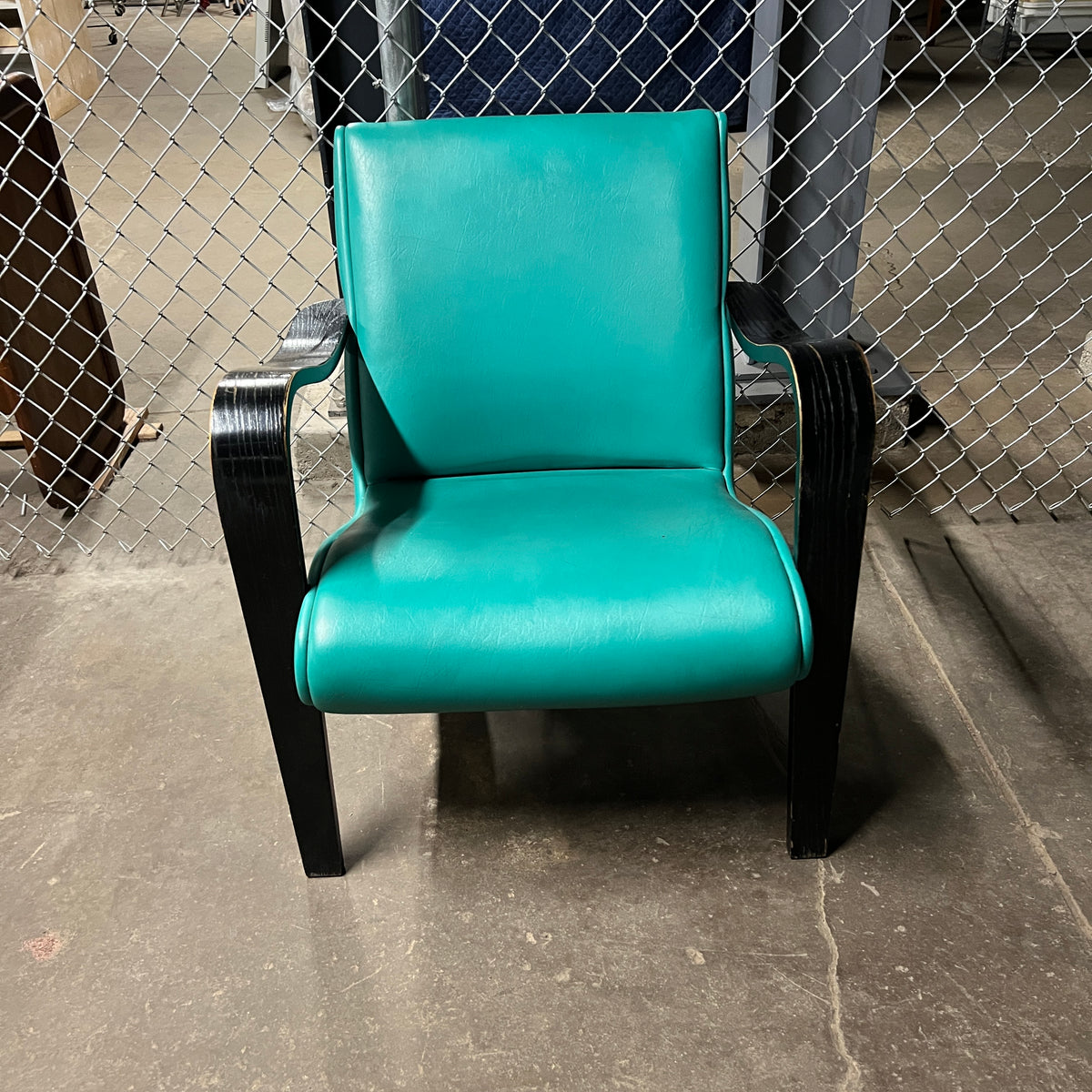 1930's Thonet bentwood lounge chair. The chair features bentwood arms and legs in black lacquer.  The chair is solidly constructed and super comfortable. 