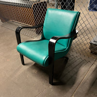 1930's Thonet bentwood lounge chair. The chair features bentwood arms and legs in black lacquer.  The chair is solidly constructed and super comfortable. 