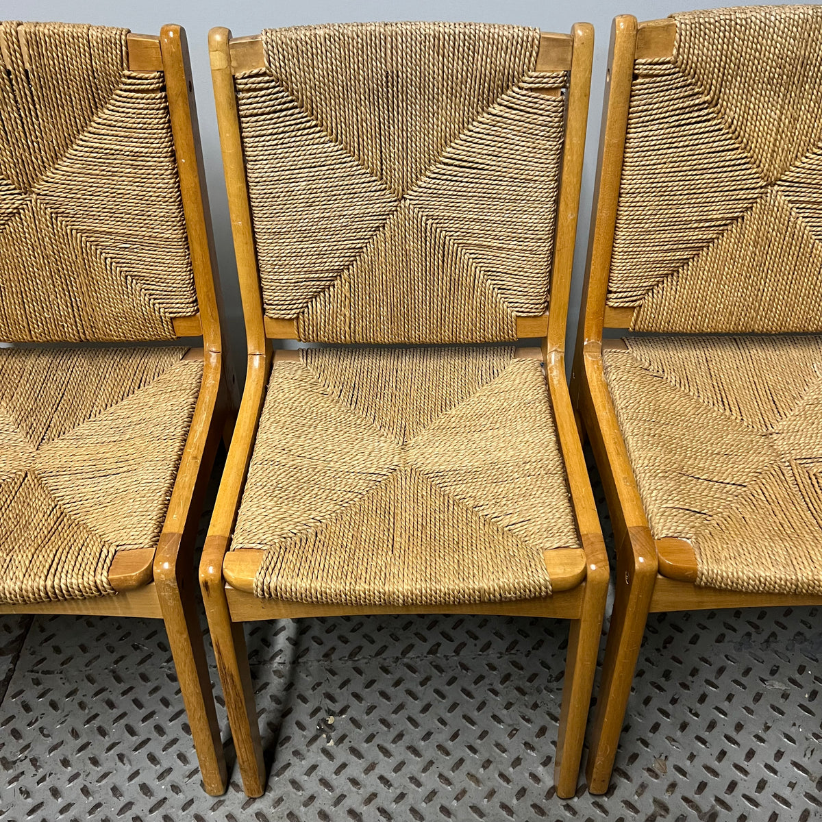 Set of 6 dining chairs with woven rush seats and backs.  Mid-century modern meets French country.  Light wood.  Vintage with some imperfections.