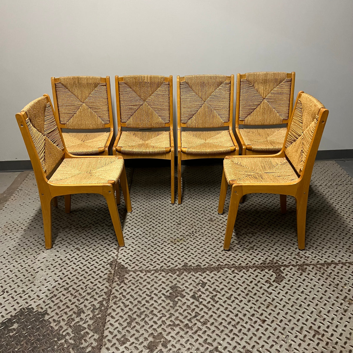 Set of 6 dining chairs with woven rush seats and backs.  Mid-century modern meets French country.  Light wood.  Vintage with some imperfections.