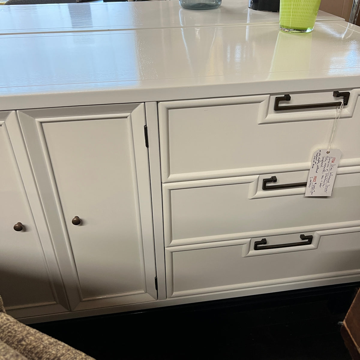 MCM dresser by American of Martinsville. Asian influence, black lacquer base with brass trim, brass pulls and an off-white lacquered case. chicago