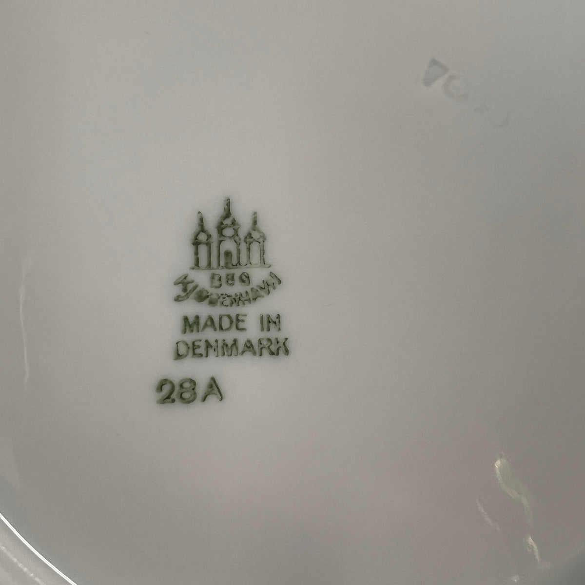 Designed by Sigvard Bernadotte for B&G. White dinner service with scalloped edges.  Dinner plates (10) , salad plates (13) and bread plates(12). Mid-Century