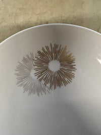 Rosenthal's Sunburst China with gilt silver and gold sunburst detail on a white field. Place settings include: dinner, salad, bread plate, cup and saucer. Gift.