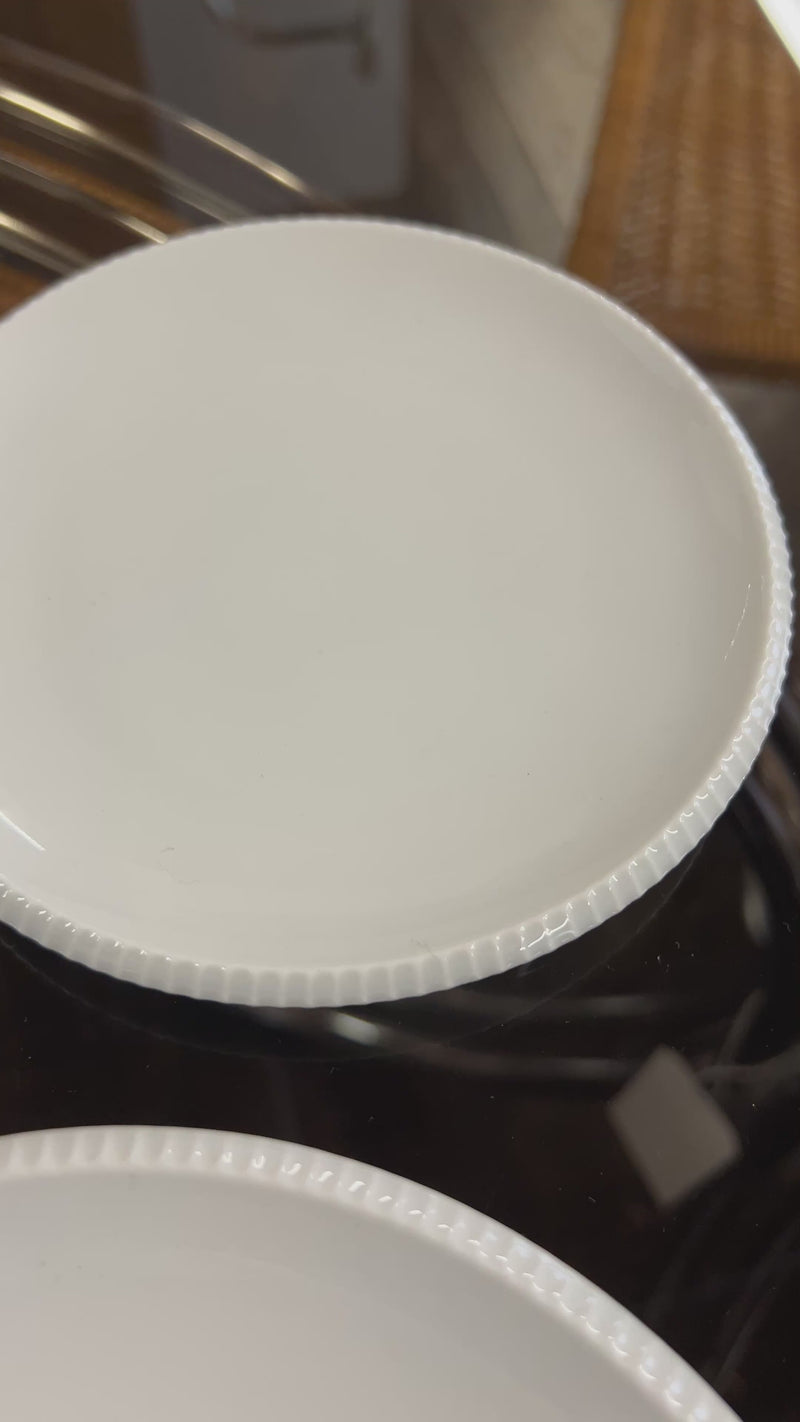 Designed by Sigvard Bernadotte for B&G. White dinner service with scalloped edges.  Dinner plates (10) , salad plates (13) and bread plates(12). Mid-Century