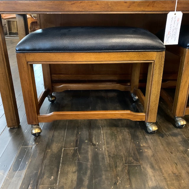 From Drexel's Et Cetera Collection, a lovely console table that has a black lacquer case with one long drawer (perfect place for keys or mail at an entrance) on walnut legs.  Case is painted with a lovely Asian scene (on all 4 sides).  Top of piece has a few scratches (see images).  It is in very good, original, vintage condition.  Has two, newly reupholstered stools on wheels (upholstery is a high-end black vinyl).  Studio Sonja Milan, Chicago