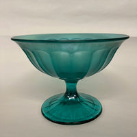 Beautiful greenish blue iridescent pedestal dish by Fenton.   No imperfections.  Lovely vintage condition.  Studio Sonja Milan, Chicago, IL