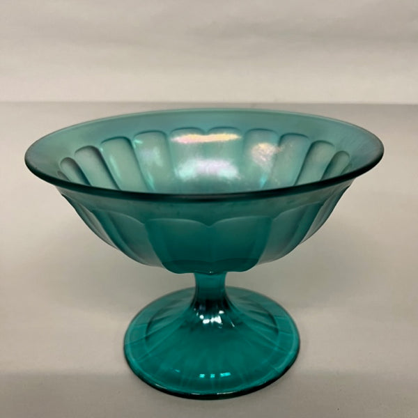 Beautiful greenish blue iridescent pedestal dish by Fenton.   No imperfections.  Lovely vintage condition.  Studio Sonja Milan, Chicago, IL