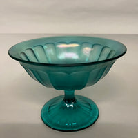 Beautiful greenish blue iridescent pedestal dish by Fenton.   No imperfections.  Lovely vintage condition.  Studio Sonja Milan, Chicago, IL
