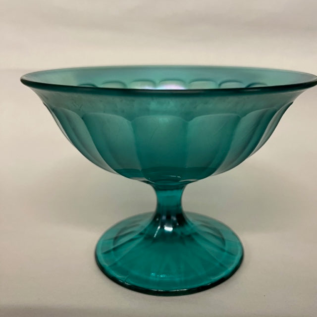 Beautiful greenish blue iridescent pedestal dish by Fenton.   No imperfections.  Lovely vintage condition.  Studio Sonja Milan, Chicago, IL