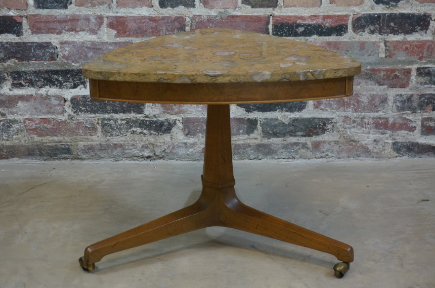 Beautiful petite side table with a pecan tripod base, small hooded brass casters and a Pernige marble (marble from Portugal with beautiful fossil detail) top. 