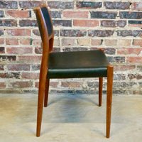 Niels O Moller Teak and black leather dining chairs.