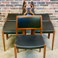 Niels O Moller Teak and black leather dining chairs.