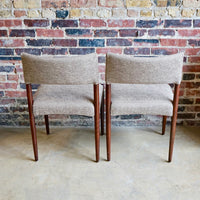 Set of 4 Danish modern dining chairs. Set includes 2 armchairs and 2 side chairs. Upholstery is in shades of cream and light browns. Upholstery is in very good condition. 