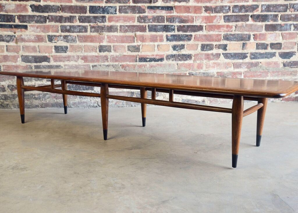 From Lane's Acclaim collection, circa 1960's, this extra long surfboard coffee table is a timeless classic. Top was just restored. 