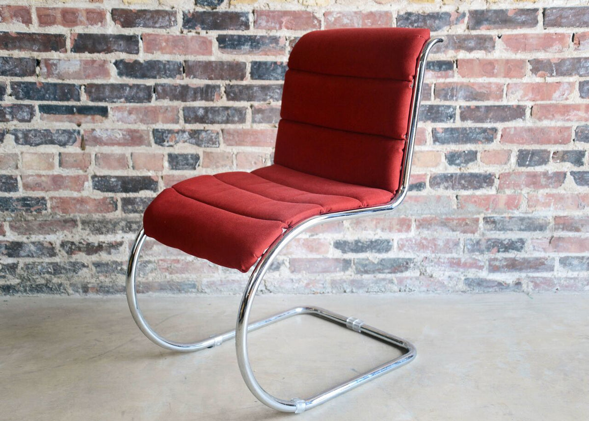 Set of mid-century dining chairs, chrome wire frames and cantilevered design. Red upholstery is snapped in place on the frame. Similar to the Willy Rizzo for Cidue Italy